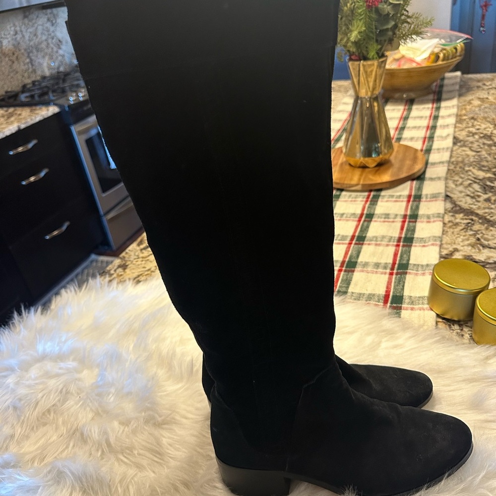 Black knee high boots. Wide calf fit!